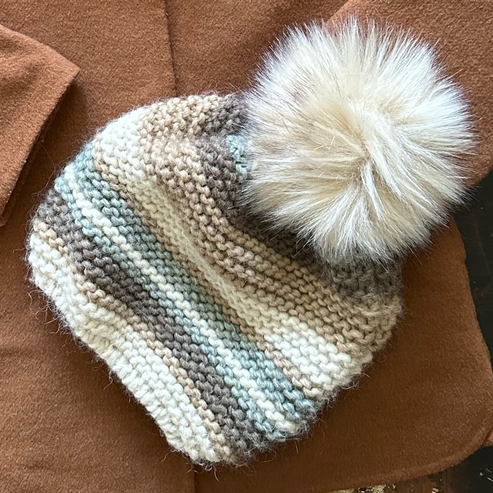 Gelso Bianco children knitted pom pom hat in neutral colours. Size for toddler